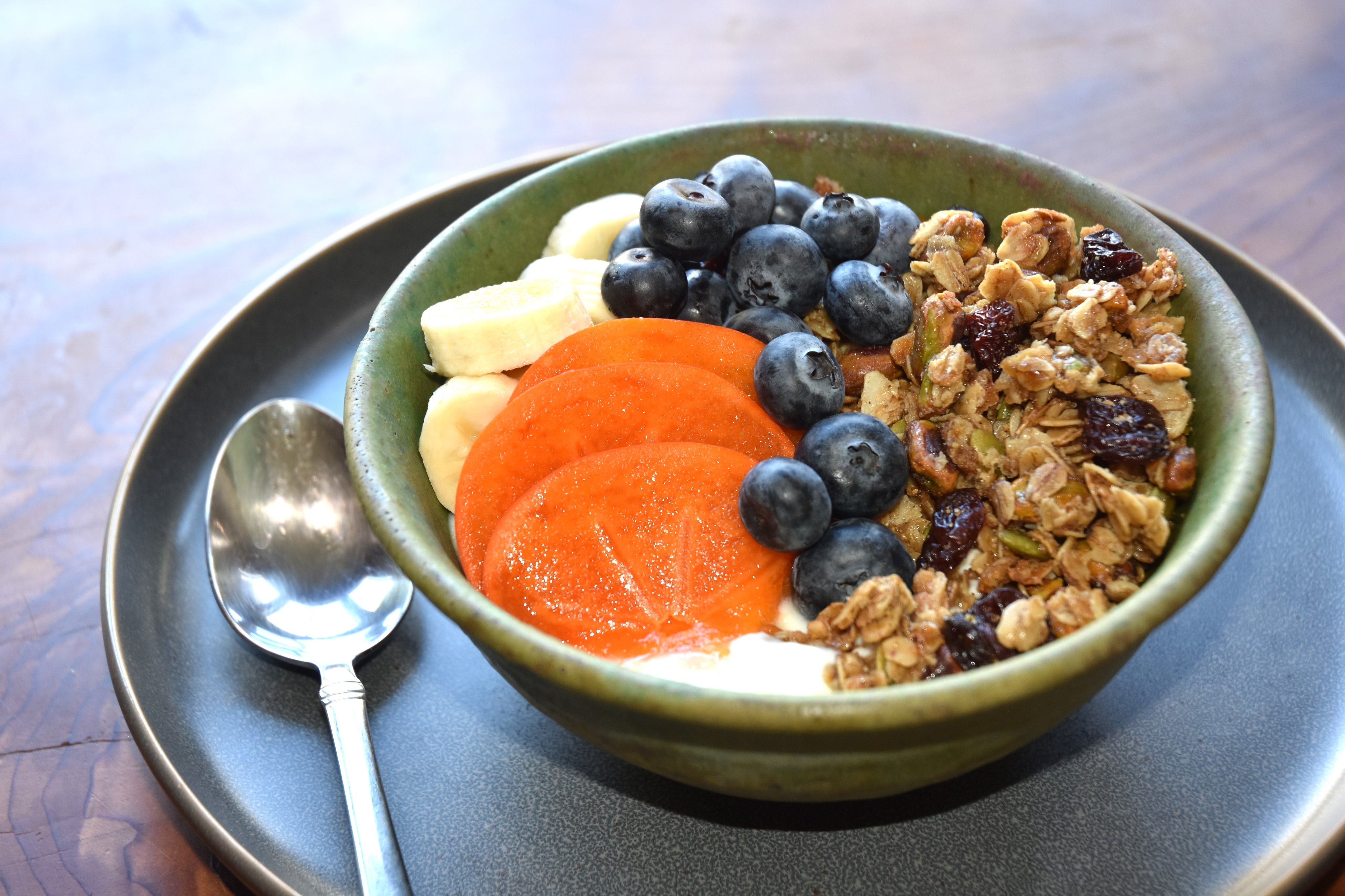 bowl of granola and fruit, granola with dried cherries pistachios coconut maple syrup healthy granola, healthy granola bowl, magnolia granol-ia la jolla farmers market, la jolla open aire market, best granola san diego, best granola in the world, granola bowl recipes, granola breakfast recipes, healthy granola, delicious granola san diego, eleven madison park granola san diego, eleven madison park granola best granola ever